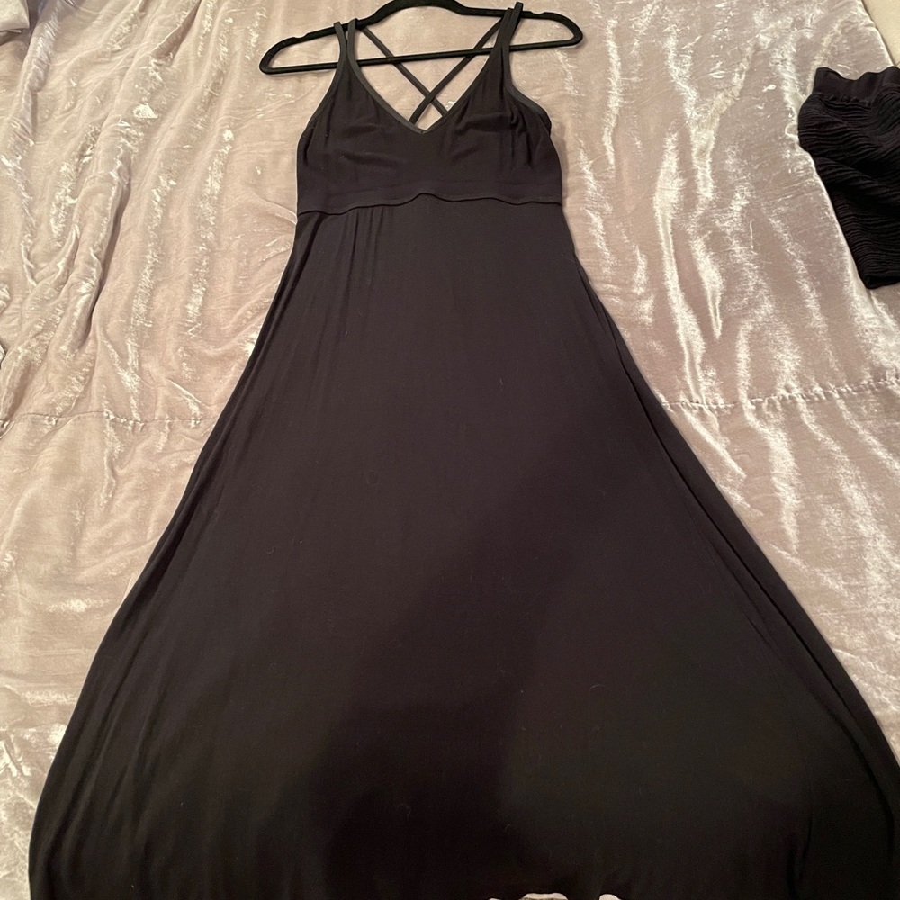 Summer midi dress with built in bra and adjustable straps. Size M color black
